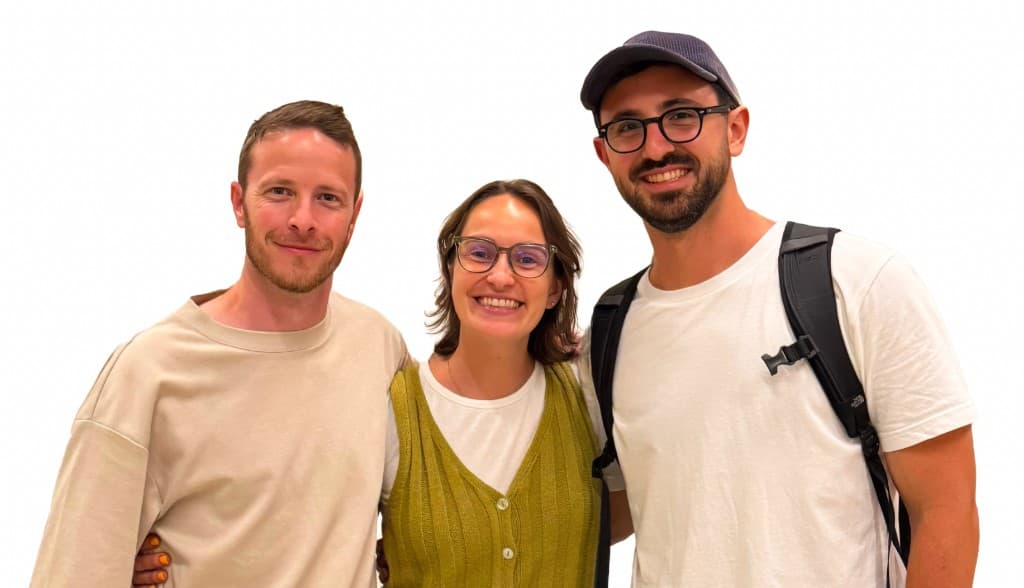 Yiftach Kelman, Daniela Rojas, and Sebastian Albagli standing together